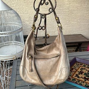 Frye bank tan leather hobo purse. Shoulder & crossbody, tassels and pockets